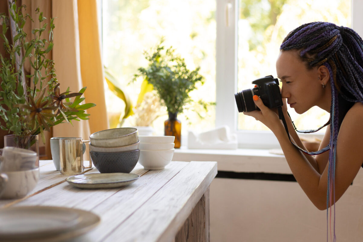 woman taking photos ceramic kitchenware