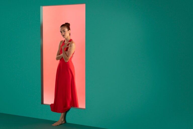 portrait beautiful woman posing flowy red dress